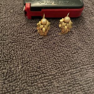 Pearl earrings with gold leaves.  Costume jewelry.  Great condition.